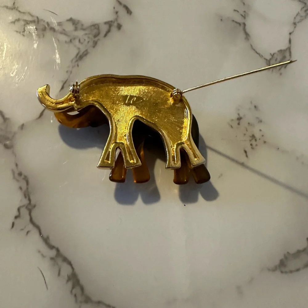 Liz Claiborne faux tortoise‎ and gold tone elephant brooch